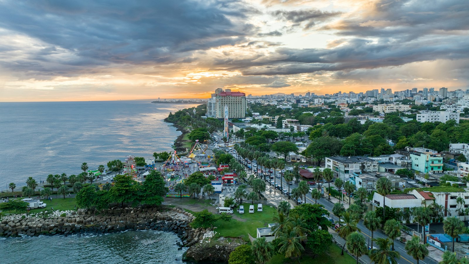 Aerial view of the Malecon seafront and city skyline of Santo Domingo, Dominican Republic, at sunset